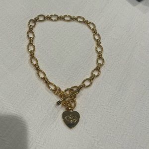 Gold juicy couture charm necklace